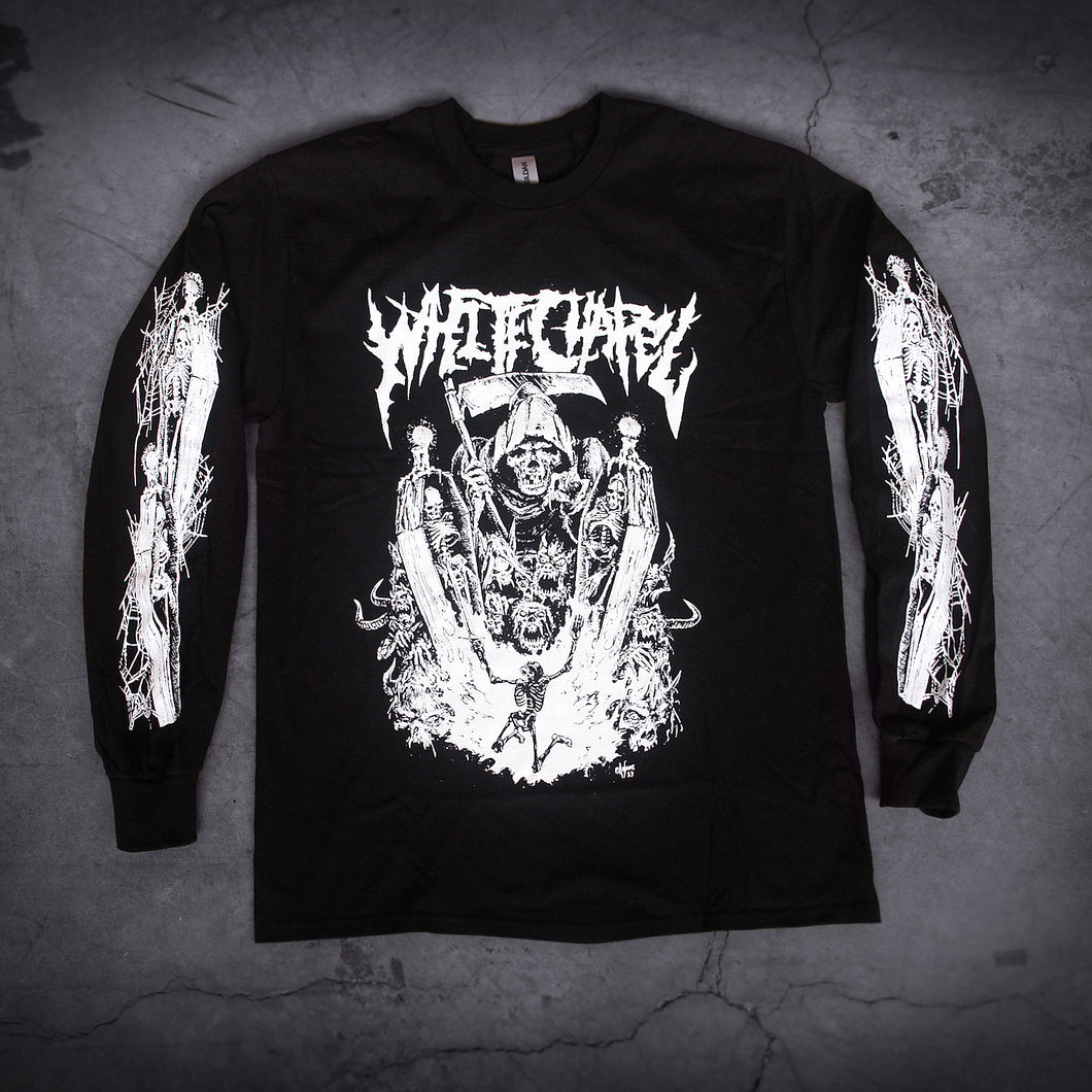 image of a black long sleeve tee shirt laid on a concrete floor. front has full body print in white of a grim reaper looking over a skeleton. at the top says whitechapel. each sleeve has prints of skeletons in coffins