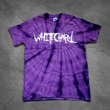 Load image into Gallery viewer, image of a purple spider tie dye tee shirt on a cracked concrete background. tee has front center chest print across in white that says Whitechapel
