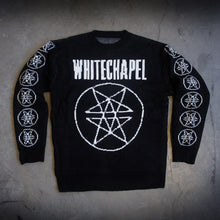 Load image into Gallery viewer, image of a custom black woven sweater laid flat on a concrete floor. sweater has white thread. the front has a full body double pentagram in the center and says whitechapel at the top across the chest. each sleeve has six double pentagrams 
