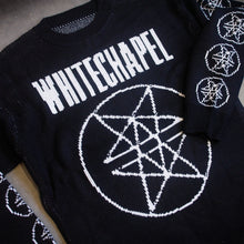 Load image into Gallery viewer, image of a custom black woven sweater laid flat on a concrete floor. sweater has white thread. the front has a full body double pentagram in the center and says whitechapel at the top across the chest. each sleeve has six double pentagrams 
