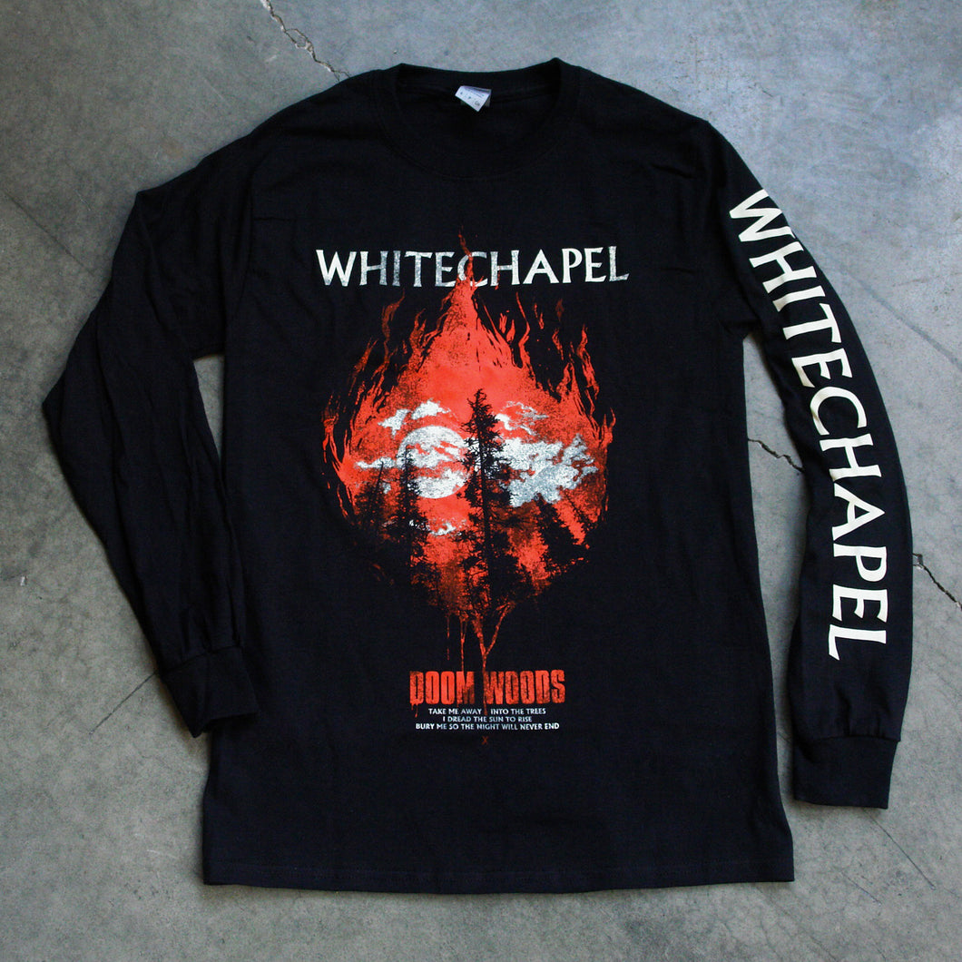 Image of a black longsleeve against a grey concrete background. Across the chest in white text reads 