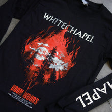 Load image into Gallery viewer, close up Image of a black longsleeve against a grey concrete background. Across the chest in white text reads &quot;whitechapel&quot;. Below this is an image of trees with a full moon and clouds in the sky. The image is red, and the image itself is shaped like a burning flame. Below this in Red text it says doom woods. below this in white text it says &quot;take me away, into the trees, dread the sun to rise, bury me so the night will never end&quot;. the left sleeve says &quot;whitechapel&quot; in white descending text. 
