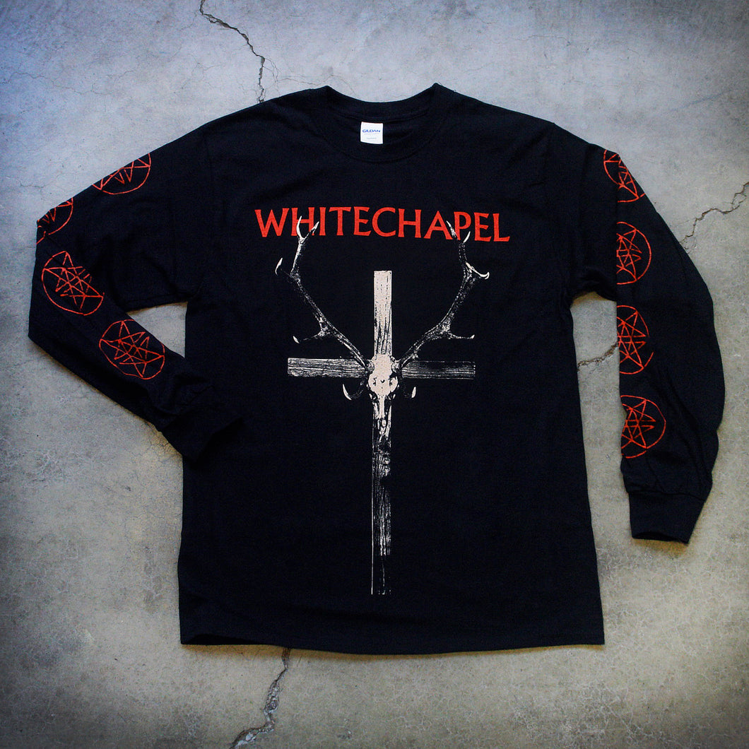Image of a black longsleeve against a grey concrete background. Across the chest in red text reads 