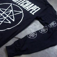Load image into Gallery viewer, Close up Image of the front of a black longsleeve against a grey background. Across the chest in big white letters says &quot;whitechapel&quot;. Below that is what is what is called a large double pentagram-  it is a white circle with two stars mirroring each other on the inside of the circle. Both sleeves also have double pentagrams going down the sleeves from the top to the bottom.
