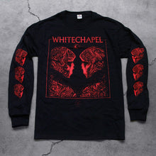 Load image into Gallery viewer, Image of the front of a black longsleeve on a grey concrete background. The front shows two skulls/skeletal figures from the shoulders up looking at one another- made up of red and black oil. This is outlined in a thin red square. Above the square in red text with the top line of the square going through the letters reads &quot;whitechapel&quot;. Below the word &quot;whitechapel&quot; is a red image of an opened eyeball. Both sleeves have 3 of the skeletal figure heads on them, facing inwards.
