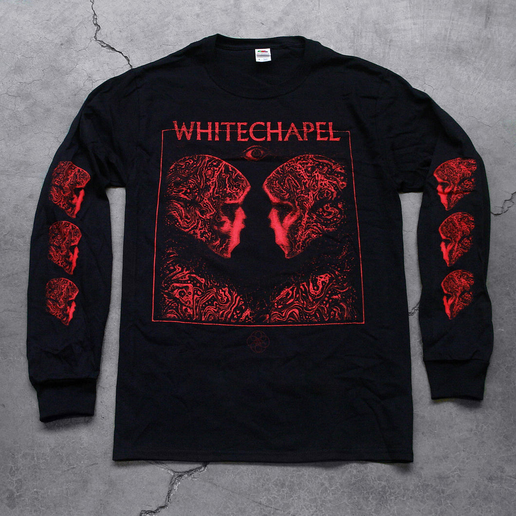 Image of the front of a black longsleeve on a grey concrete background. The front shows two skulls/skeletal figures from the shoulders up looking at one another- made up of red and black oil. This is outlined in a thin red square. Above the square in red text with the top line of the square going through the letters reads 
