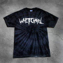 Load image into Gallery viewer, image of a black spider tie dye tee shirt on a cracked concrete background. tee has front center chest print across in white that says Whitechapel
