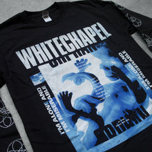 Load image into Gallery viewer, close up  Image of a black long sleeve against a grey concrete background. Across the chest in white distressed text reads &quot;whitechapel&quot;. below this is a white and blue square with what looks like a growing fetus floating. The sides of the square in white text read &quot;I&#39;m alone and I&#39;m miserable&quot;. There are small white words across the graphic of the fetus with words to a whitechapel song. The sleeves feature a white circle abstract design with lines and two stars in the center making a double pentagram.
