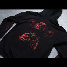 Load image into Gallery viewer,  close up Image of the back of a black hoodie against a concrete grey background. There is a red graphic of a person&#39;s face with their eyes closed, head up. They have blood on them and are clutching a skull.  The sleeves feature red graphics that are abstract and drip blood.
