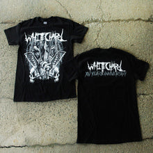 Load image into Gallery viewer, Image of the front and back of a black tshirt against a grey concrete background. The front of the shirt says &quot;whitechapel&quot; across the chest in white heavy metal style font. Below that is a white, grey, and black graphic of spines, a heart, bones, and two skeleton skulls, one facing towards the left, and the other mirrored, facing towards the right. The back of the shirt says &quot;whitechapel&quot; across the shoulders in white heavy metal style font. below that in the same font in grey reads &quot;xv years anniversary&quot;.
